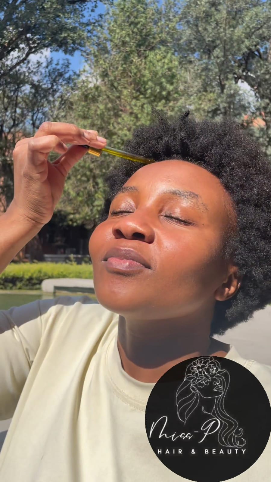 Model showcasing healthy hair with MISSP Hair Growth Oil